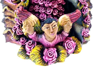 Stunning Guadalupe adorned in a Cape with Delicate Pink Roses