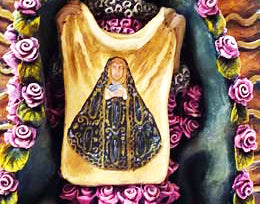 Stunning Guadalupe adorned in a Cape with Delicate Pink Roses