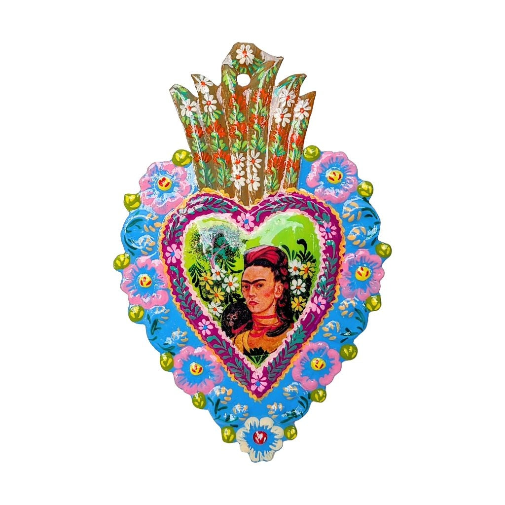 painted tin heart ornament of Frida Kahlo