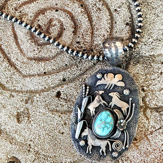 Storyteller Turquoise Pendant by Navajo Artisan Lorenzo Juan