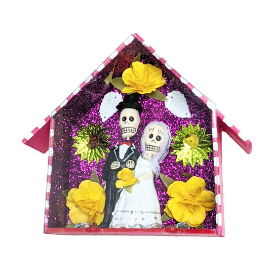 Day of the Dead skeleton couple in wedding chapel